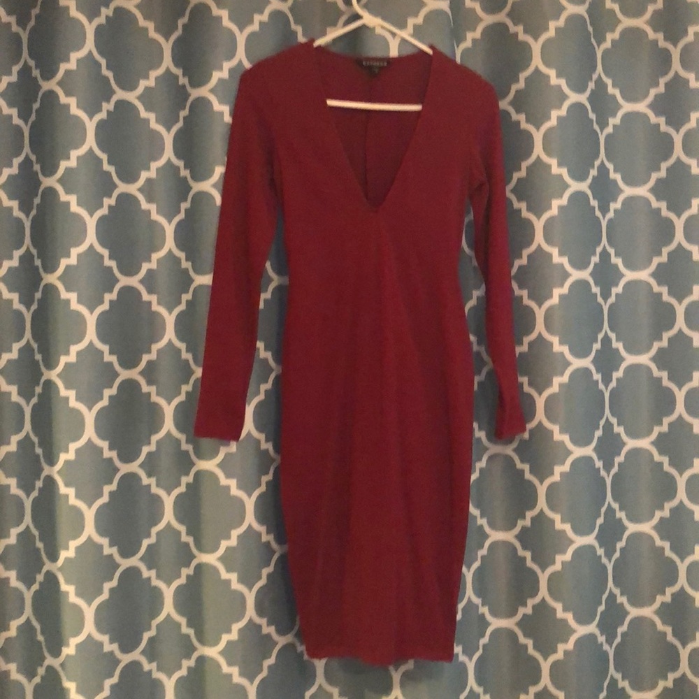 Never worn Sleek & Sexy low cut dress